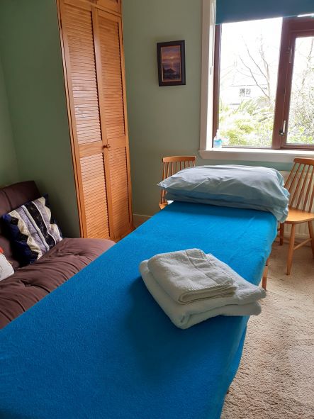 Therapy room with massage bed
